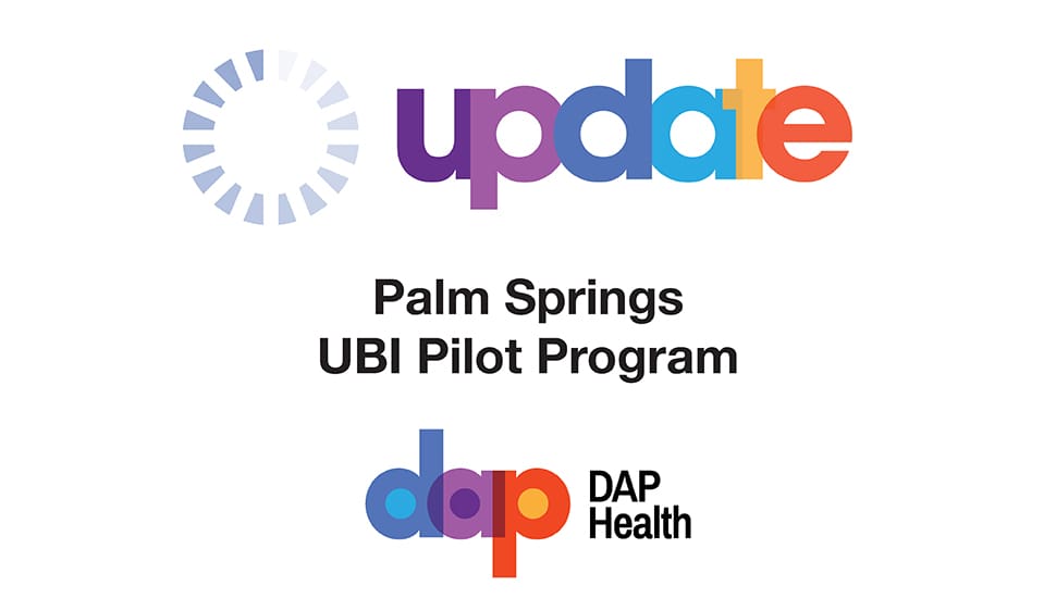 Graphic with the word "update" in a multicolor gradient, a circular loading icon to the left, and text reading "Palm Springs UBI Pilot Program." Below is the dap daphealth logo in rainbow colors. White background.