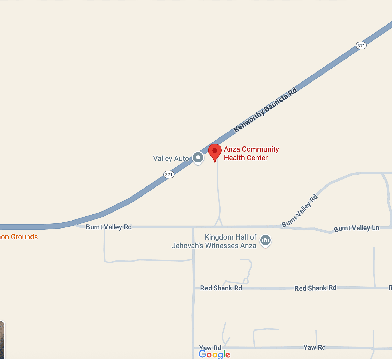 A map showing Anza Community Health Center marked by a red location pin near Kenworthy Bautista Rd and Burnt Valley Rd. Nearby, Valley Auto and Kingdom Hall of Jehovah’s Witnesses Anza are labeled. Several local roads are visible.