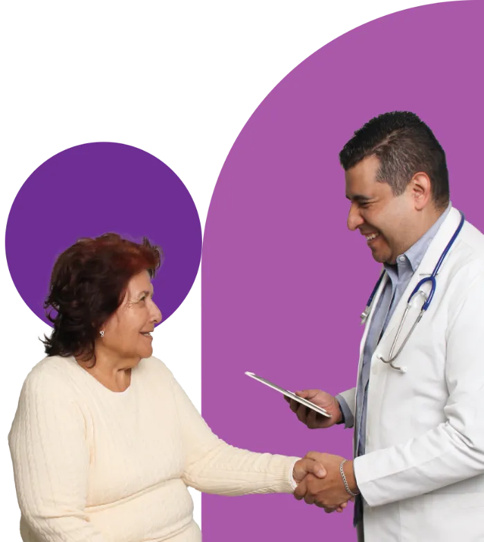 A smiling elderly woman in a light sweater shakes hands with a male doctor wearing a white coat and stethoscope. The doctor holds a tablet and smiles at her. The background features abstract purple shapes.