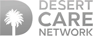 Logo for Desert Care Network. A large, silver letter "D" on the left contains a palm tree silhouette. To the right, "DESERT CARE NETWORK" is written in bold, uppercase letters stacked in three lines.